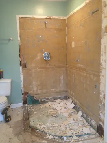 Bathroom during demolition before shower renovation