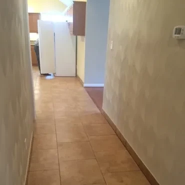 New flooring and finished interior walls during a home update